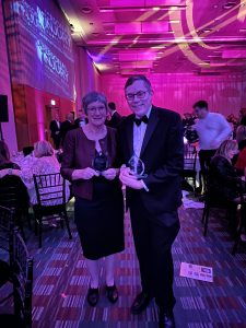 Jenny Kennedy & David Marshal with their prizes at the PI Awards ceremony